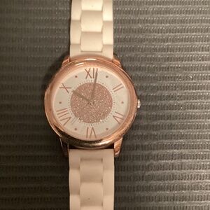 Vintage Claires sparkly pink ladies watch. Runs fine.